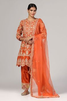 Orange silk chanderi kurta with zari and aari embroidery. Comes with salwar and an organza dupatta. - Aza Fashions Designer Silk Salwar Kameez With Zari Work, Chanderi Sets With Gota Work In Traditional Drape, Traditional Chanderi Sets With Gota Work, Festive Silk Salwar Kameez With Zari Work, Festive Chanderi Kurta With Zari Work, Festival Silk Salwar Kameez With Zari Work, Traditional Drape Sharara In Tissue Silk With Dabka Work, Silk Salwar Kameez With Dori Work For Festivals, Bollywood Style Silk Kurta With Zari Work