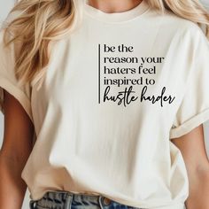 a woman wearing a t - shirt that says, be the reason your haters feed inspired to hustle harper