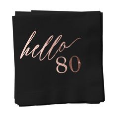 black and rose gold foiled paper napkins with the word hello 50 printed on it