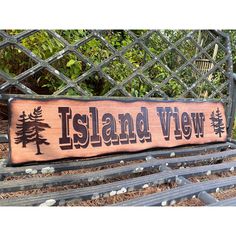 a wooden sign that says island view on it