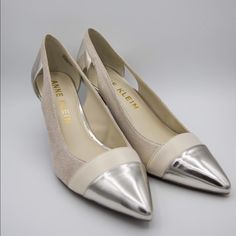 Dress Cream With Metallic Toe And Heel Spring Silver Heels With Branded Heel Counter, Silver Low Heel Heels, Metallic Silver Leather Heels For Spring, Silver Almond Toe Heels For Spring, Spring Silver Almond Toe Heels, Cocktail Shoes, Anne Klein Shoes, Dress Cream, Cream Dress