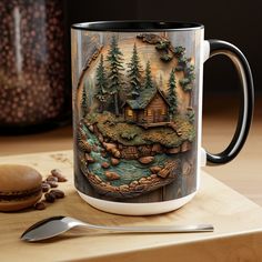 a coffee mug sitting on top of a wooden table next to a spoon and fork