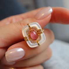 "Mid-Century Style Tourmaline Ring, Natural Pink Tourmaline Engagement Ring, Vintage Wedding Bridal Ring for Women, Pink Gemstone Ring, Gifts Material: 925 Sterling Silver with Gold Plated Gemstone: Natural Pink Tourmaline, Mother of Pearl & CZ Ring Size: Adjustable for US 4 to US 9 Don't forget to find more designs from our shop: https://www.etsy.com/hk-en/shop/NikiFashionJewelry Be sure to hit \"favorite\" on the right so it remains in your favorites list and/ or add to your wish list(s). Hope Elegant White Crystal Ring With Gemstone Accents, Elegant Wedding Birthstone Ring With Stones, White Multi-stone Elegant Crystal Ring, Pink Enamel Round Ring For Wedding, Pink Round Enamel Ring For Wedding, Ruby Open Ring With Stone Setting For Wedding, Pink Round Enamel Wedding Ring, Exquisite Ruby Ring With Gemstone Accents For Wedding, Elegant White Multi-stone Crystal Ring