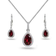 Wear this stylish set to enhance your daytime and evening attire. This beautiful jewelry set features dangling pear-cut created ruby gemstones in a white topaz encrusted halo design, for a dazzling evening look. The earrings measure 9.5mm in width & 11.6mm in length and the pendant measures 11.5mm in width & 25mm in length. This luxurious jewelry set is crafted of fine sterling silver and is nickel & tarnish free. The pendant hangs from a 18 inch rolo chain and secures by a spring-ri Dangling Necklace, White Topaz Necklace, Luxurious Jewelry, Halo Design, Topaz Jewelry, Ruby Jewelry, Leverback Earrings, Teardrop Necklace, Earrings Women