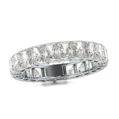 A stunning celebration of your commitment, this fancy-shape diamond eternity band is a confident choice for your bride or bride-to-be. Expertly crafted in sleek platinum, this sensational style showcases sparkling 1/5 ct. radiant-cut diamonds - each boasting a color rank of G and clarity of VS2 - that surround the endless band. This breathtaking design is beguiling on its own or paired with her diamond solitaire. Dazzling with 5 cts. t.w. of diamonds and a brilliant buffed luster, this eternity Luxury Platinum Eternity Band With Baguette Cut, Radiant Cut Brilliant Diamond Eternity Band For Anniversary, Luxury White Gold Radiant Cut Eternity Band, Luxury Radiant Cut White Gold Eternity Band, Luxury Silver Asscher Cut Eternity Band, Luxury White Gold Eternity Band With Baguette Cut, Luxury Asscher Cut Eternity Band With Prong Setting, Radiant Cut Diamond Eternity Band For Anniversary, Luxury Asscher Cut Diamond Ring With Halo