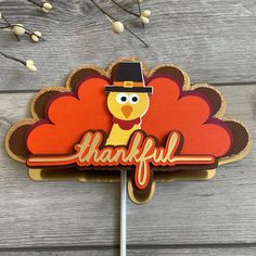 a sticker that says, happy thanksgiving with a turkey on it's head