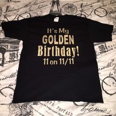 Golden Birthday shirt! This listing is for a single sided shirt - if you would like a name and age on the back, please see the listing below :) https://www.etsy.com/listing/1101353326/its-my-golden-birthday-shirt-any-age Please see the pictures for sizing, as well as for vinyl colors.  Please note, Newborn sizes only come in white. In the notes section, please include: 1. Vinyl/Writing color(s) preferred 2. Format of Birthday - (Ex: 10 on the 10th, 10 on 11/10, etc.) 3. Date needed by **Free Sta Golden Birthday Shirt, Golden Birthday, Vinyl Colors, A Name, Birthday Shirt, Unisex Shirts, Dog Person, Birthday Shirts, Womens Tank