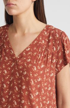 Gathers at the shoulders and across the back soften the look and sweeten the flowiness of this summery popover top. 24" length (size Medium) V-neck Short sleeves 100% viscose Machine wash, line dry Imported Short Sleeves, Nordstrom, Size Medium, V Neck, Paris