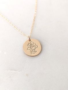 "This magnolia flower necklace has been carefully crafted of solid sterling silver or 14k gold fill. Charm measures 5/8\" (16mm) and includes a cable chain in your choice of length (16\"-20\"). Material and chain length can be selected from the drop down menu at checkout. Each piece is made to order and hand stamped using special metal tools.  For more designs please visit my shop http://www.thestampedlife.etsy.com" Magnolia Jewelry, Star Chain, Metal Tools, Magnolia Flower, Flower Necklace, Sterling Silver Charm, Cable Chain, Silver Charms, Chain Lengths