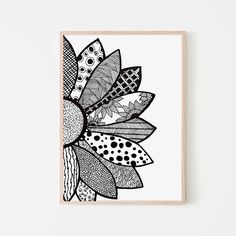 a black and white drawing of a sunflower with dots on it's petals