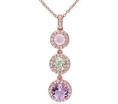 Dramatize your outfit with this multigemstone pendant that features a stunning combination of Rose de France, amethyst, and rose quartz with white topaz accents. Elegant Pink Multi-stone Necklace, Pink Gemstones In Fine Jewelry Style, Elegant Pink Gemstones With Accents, Fine Jewelry Pink Multi-stone Necklace, Pink Multi-stone Necklace As Gift, Pink Multi-stone Necklace For Gift, Pink Multi-stone Necklaces For Gifts, Pink Gemstone Accents Round Necklace, Amethyst And Rose Quartz