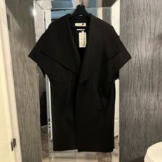 Nwt. Size S However It’s Roomy. Would Describe It As Oversized. 56% Wool 2 Deep Pockets, Handmade Elegant Sleeves Coat. Versatile And Timeless, Perfect For Casual, Work, Or Evening Outing. Zara Black Outerwear For Layering, Elegant Outerwear Vest For Layering, Modern Sleeveless Outerwear For Work, Chic Sleeveless Outerwear For Daywear, Chic Sleeveless Outerwear For Layering, Chic Black Sleeveless Outerwear, Chic Sleeveless Outerwear For Office, Zara Sleeveless Outerwear For Fall, Zara Sleeveless Fall Outerwear