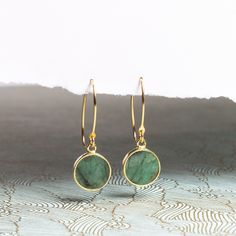 "Raw Emerald Gold Drop Earrings - Minimalist Geometric Green Emerald Circle Drop Earrings - Gold Jewelry gifts for her, mom, wife, daughter NECKLACE SOLD SEPARATELY Stone: Genuine Raw Emerald Please note due to nature of our genuine stones no two are alike and the ones you will receive will vary slightly from the ones pictured in the photos. Bezel: Vermeil Gold Ear-wire: 14k Gold Filled Total length of earring: 35mm Circle Gemstone: 12mm diameter About \"Gold Filled Jewelry\": Also called rolled Minimalist Yellow Gold May Birthstone Earrings, Minimalist Yellow Gold Earrings For May Birthstone, Hoop May Birthstone Jewelry Gift, Hoop Jewelry With May Birthstone For Gifts, Adjustable Minimalist Earrings For Gift, Minimalist May Birthstone Earrings, Hypoallergenic Round Hoop Earrings As A Gift For Her, Pierced Earrings As May Birthstone Gift, May Birthstone Drop Earrings With Ear Wire