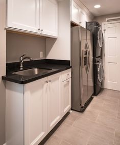 the kitchen is clean and ready for us to use it's new stainless steel appliances