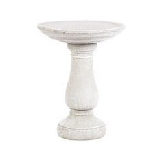 a white pedestal is shown on a white background