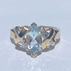 14k Yellow Gold Ladies Cocktail Ring With 1 Marquise Cut Aquamarine Gemstone With Small Diamond Accent On Sides. Ring Is Size 9.25 **Could Be Resized To Desired Size** Total Weight Is 3.1 Grams Ring Has Been Professionally Cleaned And Polished Pictures Are Part Of The Description So Please Take A Look And Feel Free To Ask For More Pics/Information $$ Reasonable Offers Accepted ** No Trades ** Thanks For Taking A Look And Happy Poshing Aquamarine Cocktail Ring, Aquamarine Gemstone, Marquise Cut, Cocktail Ring, Cocktail Rings, Womens Jewelry Rings, Aquamarine, Topaz, Yellow Gold