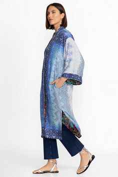 Crafted from 100% silk, the Ymeriah Kimono is a lightweight layer perfect for warmer days. Designed with an open front and half-sleeves, this fully reversible kimono features two beautifully intricate designs for versatility in styling. Layer fitted jeans and a flowing tank for a chic casual ensemble. Johnny Was Women's Ymeriah Kimono in Coopera Scarf Print Blue, Size XL, 100% Silk Silk V-neck Kimono For Daywear, Silk Long Sleeve Summer Outerwear, Spring Silk Outerwear With Kimono Sleeves, Silk Outerwear With Kimono Sleeves For Spring, Long Silk Outerwear For Spring, Casual Silk Kaftan For Spring, Silk Long Sleeve Kimono For Daywear, Blue Silk Outerwear For Fall, Blue Bohemian V-neck Outerwear