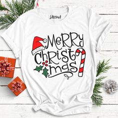 a t - shirt with the words merry christmas on it