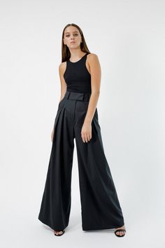 Women wide leg palazzo pants with back vents in gray color. They fit perfectly different body shapes and heights and visualize our unusual vision on basic pants. With this model you can create an incredibly stylish bridal look or comfy everyday city look. They are perfect with almost everything, cropped t-shirt to the blouse, cardigans, flat shoes, sneakers or heels you'll find them so easy to wear. Details: * High waist * Front pleats * Two side pockets   * Faux back pockets * Zip and hook-and- Elegant Fitted Wide Leg Culottes, Elegant Flared Bottoms For Wedding, Elegant Fitted Full Length Culottes, Elegant Full Length Fitted Culottes, Chic High Waist Pants For Wedding, Elegant Wide-leg Culottes For Party, Elegant Wide-leg Party Culottes, Elegant Wide-leg Bottoms For Wedding, Elegant Party Wide-leg Culottes