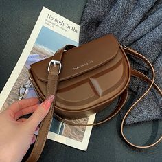 UAKISS - Spring for Women Sac A Main Designer Handbags Vintage PU Leather Saddle Crossbody Bags Ladies Totes Shopping Bag Bolso Size: 13cm( Height) × 19cm(width) × 8cm(Thickness), The length of shoulder belt: 12/120cm Note: 1 Inch=2.54 CM; 1 CM=0.39 Inch Trendy Brown Portable Bucket Bag, Trendy Portable Shoulder Belt Bag, Trendy Brown Saddle Bag With Mobile Phone Pocket, Trendy Brown Pouch With Large Capacity, Trendy Brown Saddle Bag With Phone Holder, Portable Brown Pouch Belt Bag, Brown Rectangular Belt Bag, Rectangular Brown Belt Bag, Trendy Portable Crossbody Belt Bag