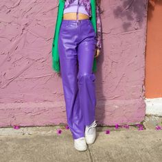 Look And Feel Like A Boss In Our Mystery Girl Faux Leather Pants. These Faux Leather Pants Have A High-Waisted Fit And Pockets In The Front, Giving You An Edgy Style That Is Still Casual. Wear Them With Your Favorite Sneakers And An Oversized Sweater To Put Your Own Spin On This Fall Look. Seen Paired With The Lilac Lounge Tank And The Purple Valley Layering Top. True To Size. 50% Polyurethane 50% Cotton Model Is 5'7 Wearing Size Small. Width: Length: Small-13' Small-31' Medium-14' Medium-31' La Colored Leather Pants Outfit, Purple Leather Pants Outfit, Purple Leather Pants, Uzun Boy, Rocker Outfit, Lululemon Groove Pant, Black Ankle Pants, Leather Pants Outfit, Black Jogger Pants