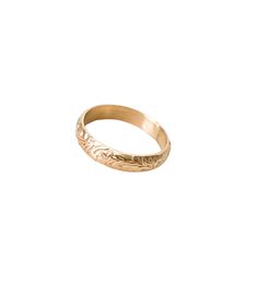 a gold ring with an engraved design on it