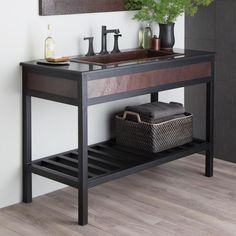 there is a sink and mirror in this bathroom with wood flooring on the walls