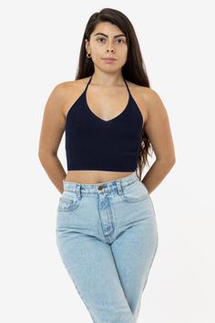 Thalia is 5'5 wearing size S Stretch V-neck Crop Top For Vacation, V-neck Halter Top With Built-in Bra For Vacation, Trendy V-neck Bra Friendly Tops, Trendy V-neck Halter Top For Vacation, Solid V-neck Halter Top For Summer, Seamless V-neck Crop Top For Vacation, V-neck Crop Top With Built-in Bra For Beach, Chic Stretch Halter Top Low-cut, Low-cut Halter Top For Summer