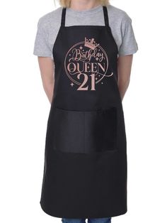 a woman wearing an apron with the words birthday queen on it