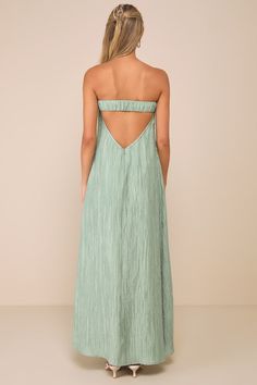 From elevated brunch looks to sunny garden cocktails, the Lulus Radiant Season Sage Green Plisse Cutout Strapless Maxi Dress is ready for all your sweet summer occasions! Plisse-textured woven fabric shapes this breezy-yet-elegant dress that has a strapless bodice with a straight neckline and hidden no-slip strips. Shift-style silhouette features a flirty back cutout (below an elasticized strap) as it falls to a maxi hem. Hidden zipper/clasp at back. Fit: This garment fits true to size. Length: Ankle length. Size medium Bust: Great for any cup size. Waist: Loosely Fitted. Hip: Not Fitted - room for hips. Undergarments: May be worn with an adhesive bra, petals, or no bra. Fabric: Fabric has no stretch. Lined. Shell: 80% Tencel, 20% Nylon. Lining: 96% Polyester, 4% Spandex. Hand Wash Cold. D Strapless Sundress For Summer Garden Party, Strapless Sundress For Garden Party, Spring Maxi Dress With Spaghetti Straps For Summer Parties, Strapless Summer Sundress With Tie Back, Sleeveless Strapless Summer Dress With Tie Back, Strapless Maxi Dress For Spring Vacation, Bohemian Strapless Sleeveless Dress For Summer, Chic Strapless Sundress With Tie Back, Chic Sleeveless Beach Dress For Garden Party