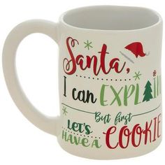 a white coffee mug with santa i can explain but first, let's have a cookie