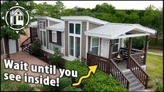 an aerial view of a mobile home with stairs leading up to it