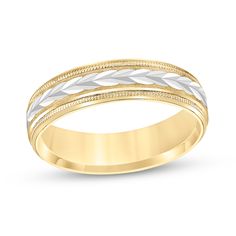 two tone gold and white wedding band with braiding in the middle, set on an 18k yellow gold ring