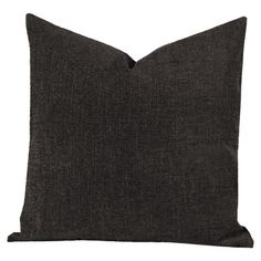 a black pillow on a white background