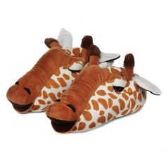 two giraffe slippers are laying on top of each other