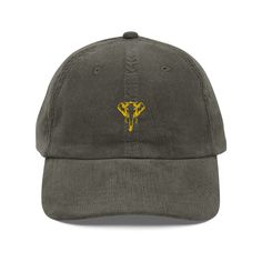 Step up your style with an embroidered old-school cap. It's crafted from 100% cotton corduroy that's soft to the touch and comfy to wear. It features an adjustable strap with a gold-colored buckle for a great fit and a visor to protect you from the sun and wind. Complete your look with this embroidered corduroy cap and rock a cool vibe all day long. * 100% cotton corduroy * Unstructured, 6-panel, low-profile * Cotton twill sweatband and taping * 6 embroidered eyelets * Adjustable strap with a gold-colored metal buckle * Head circumference: 20″-22″ (50.8 cm-56 cm) This product is made especially for you as soon as you place an order, which is why it takes us a bit longer to deliver it to you. Making products on demand instead of in bulk helps reduce overproduction, so thank you for making t Cute Pigeon, Outdoor Hut, Embroidered Corduroy, Corduroy Cap, Vintage Corduroy, Embroidered Cap, Dad Cap, Vintage Cap, Embroidered Caps