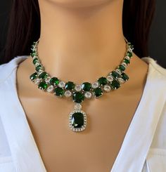 Emerald CZ diamond necklace, American Diamond wedding necklace, Cz jewelry, Indian, Pakistani, Punjabi wedding jewelry, Bridal necklace Regular Size And Adjustable with rhodium finish Earrings Length 2 inches  Ships from California, USA Delivery in 2-5 business days in the USA. Other colors can be found here https://www.etsy.com/listing/1423097794/sapphire-cz-diamond-bridal-necklace?ref=listings_manager_grid https://www.etsy.com/listing/1423095388/emerald-cz-diamond-bridal-necklace?ref=listings_ Wedding Diamond Necklace With Jewels In Cubic Zirconia, Wedding Diamond Necklace With Cubic Zirconia, Wedding Cubic Zirconia Diamond Necklace, Fine Jewelry Emerald Necklace With 17 Jewels For Wedding, Wedding Diamond Necklace With Jewels, Luxury Green Diamond Necklace For Wedding, Hand-set Cubic Zirconia Emerald Necklace For Wedding, Wedding Silver Emerald Cubic Zirconia Necklace, Wedding Silver Emerald Necklace With Cubic Zirconia