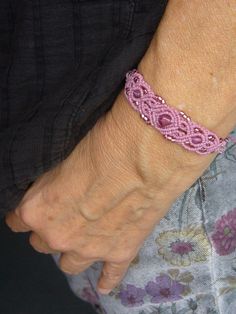 Filigree macrame bracelet in pink with incorporated glass beads, bicones and rocailles. It closes with a sliding clasp and can be individually adjusted to the wrist. Maximum slip width approx. 20 cm, for narrow hands! Knotted with waxed polyester yarn (Linhasita) Delivery time Germany 3-5 days. Delivery time to countries within the EU 7 to 14 days Shipping with tracking Pink Macrame Jewelry As A Gift, Pink Adjustable Macrame Bracelets, Adjustable Pink Macrame Bracelets, Pink Macrame Braided Bracelets As A Gift, Pink Macrame Bracelets As Gift, Adjustable Pink Macrame Bracelet, Pink Macrame Braided Bracelet As Gift, Pink Macrame Bracelets For Gift, Pink Macrame Bracelet Jewelry