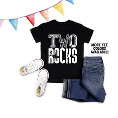 Two Rocks!►Need to add a name and/or number to the back of these tees? No problem, you can purchase the additional lettering here:https://www.etsy.com/listing/262819904/add-on-additional-lettering-to-the-back?ref=shop_home_active_1_________________________________________________Every tee is handmade to order with love.Printed on Kavio & Bella+Canvas Brand Unisex tees, these can run true to size or run smaller - we always advise checking the size chart to ensure proper fit (see photos). Please n Birthday Band Merch Tops With Short Sleeves, Short Sleeve Band Merch Tops For Birthday, Band Merch Tops For Birthday With Short Sleeves, Black Band Merch T-shirt For Birthday, Born Two Rock Birthday, Rock And Roll Birthday, Rock N Roll Party, Two Birthday, Birthday Boy Shirt