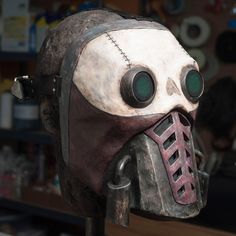 "Inspired by the Bandit Steve character from the Borderlands 2 video game, this hand-made mask is a resin cast of my original hand-sculpted version. It has been painted and weathered to match the look of the mask in the game, and it includes interior padding and an adjustable leather strap. Perfect for display or your Borderlands costume! The mask in the photos is an example only -- the masks are hand-painted and each one is slightly different. The material is urethane resin from Smooth-On. The Borderlands Bandit, Terry Gilliam, The Bandit, Painted Resin, Bioshock, Resin Casting, Borderlands, The Mask, Easy Paintings