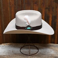 Saddle up in western style with Charlie 1 Horse's Silverbelly hat! Feel confident and fierce in this high-quality, handcrafted accessory. Complete your look and stand out from the crowd with this must-have hat that will never go out of style. Additional Information: PLU: HTC-CWSDUP-9540 Brand: CHARLIE 1 HORSE Western Concho Hat Bands For Rodeo, Southwestern Wide Brim Felt Hat For Western-themed Events, Western Hats For Ranch, Country Style Concho Hat Band For Rodeo, Custom Adjustable Felt Hat For Western-themed Events, Southwestern Felt Hat With Short Brim For Ranch, Western Style Fedora For Country Events, Adjustable Felt Hat For Rodeo And Kentucky Derby, Custom Brimmed Felt Hat For Ranch