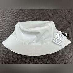 Lululemon White Women’s Bucket Hat. New With Tags White Bucket Hat, Hat Shop, Poshmark Lululemon, Bucket Hat, Lululemon Athletica, Color White, Women Accessories, Tags, Hats