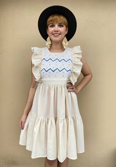 "Amazing hand embroidered mexican ruffled dress Wear this trendy 2 layer ladies ruffle sundress with you anywhere you go. Whether it's a Mexican party, the beach, mall or just at your house. We hand make every item so yours will always be unique! To close it, has a zipper on the side Very loosefit Fabric: Muslin Fits size SMALL Measurements taken flat: Armpit to armpit 19 1/4¨ Waist 16\" Shoulder to bottom hem 36¨" Bohemian Midi Dress With Ruffle Sleeves For Spring, Bohemian Ruffle Sleeve Dress For Vacation, Bohemian Dress With Ruffle Sleeves For Vacation, Bohemian Summer Dresses With Ruffle Sleeves, Bohemian Midi Dress With Ruffle Sleeves, Cream Folk Dress For Spring, Folk Style Cream Dress For Spring, Bohemian Embroidered Tiered Dress, Bohemian Midi Dress With Ruffle Hem