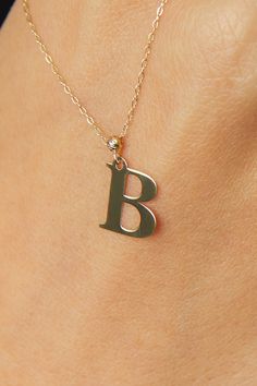 "High quality Initial necklace for everyday wearing. Initial B Letter Necklace Gold 14k, Personalized Initial Necklace, Initial Necklace for Women, Initial Gold Necklace, Gold Initial Pendant *60 Day Return Policy We are committed to your satisfaction. Engraved or non-engraved; if you are not happy with your choice, return it in original condition within 60 days. ITEM DETAILS Material: B Letter Necklace is 14K Solid GOLD (not filled or plated).  * Gold Necklace Chain Length: 18\" inch (45cm)  * Gold Polished 14k Gold Initial Necklace, Classic Gold Initial Necklace For Formal Occasions, Classic Yellow Gold Initial Necklace For Anniversary, Elegant Sterling Silver Initial Necklace, Elegant Gold Initial Necklace With Polished Finish, 14k Yellow Gold Polished Initial Necklace, Elegant Sterling Silver Initial Necklace With Polished Finish, Classic Initial Necklace For Anniversary, Elegant Yellow Gold Initials Necklace