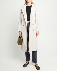 Price Comparison Few Moda $109 Everlane $298 Reformation $368 Product Details The Louie Trench Coat is a timeless wardrobe staple. Crafted from light and comfortable fabric, this classic trench coat features lapels, an adjustable waist tie, and front buttons for a custom fit. An elegant addition to any wardrobe. - Front buttons and adjustable waist tie- Lining- Pockets- Content: Main Fabric: 58% Cotton, 42% Polyester ; Lining: 100%Polyester Style# C23WOU50120G Fit Notes - Model wearing a size S Timeless Belted Long Sleeve Outerwear, Timeless Gabardine Outerwear For Fall, Timeless Fall Outerwear With Belted Cuffs, Timeless Outerwear With Belted Cuffs, Timeless Gabardine Outerwear For Spring, Timeless Outerwear With Belted Cuffs For Fall, Timeless Spring Outerwear With Double Button Closure, Timeless Spring Outerwear With Button Closure, Timeless Belted Outerwear For Spring