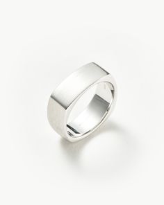 Mens Engravable Matte Wide Ring | Sterling Silver. Handcrafted for Him. The Chunky Band Ring in Classic Sterling Silver is Upgraded with a Brushed Finish and Curved Edges, Plus It Can be Engraved on Top. Pair with a Chunky Chain Bracelet to Create a Statement Look. Please Note: Engraving Items May Take 7-10 Working Days to Process. Metal: Rhodium Plated on Recycled Sterling Silver Band Height: 8mm Weight: 10. 9g Product Code: Mj-S-R3-Ns Handmade Silver Jewellery, Wide Ring, Gold And Silver Rings, Star Earrings Stud, Wide Rings, Men Jewelry, Ring Size Guide, Pearl Stud Earrings, Recycled Sterling Silver