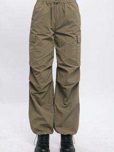 Take your style to new heights with our New Heights Parachute Cargo Pants. They come with adjustable elastic fastening at the waist and ankles, perfect for any fit and any flight! Whether you're climbing new mountains or just looking fly, these pants are sure to take you to far-out places! Color: Green, Olive, Khaki, or Black Fabric: 100% Nylon Includes: x1 Pair of Pants Sizes: S-M-L, Regular Sizing Loose Fit Cargo Pants, Parachute Cargo Pants, Fit Cargo Pants, Parachute Cargo, Pants Fit, Loose Pullover, Oversized Style, Cargo Pants Women, Sheer Fabric