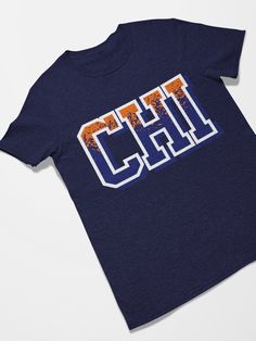 Chicago Football Retro Sports Letters Tee Shirt Makes a great gift for Father's Day, Mother's Day, Birthdays and for retro 90's parties. Celebrate 90's and 80's retro pop culture in style. The unisex heavy cotton tee is the basic staple of any wardrobe. It is the foundation upon which casual fashion grows. All it needs is a personalized design to elevate things to profitability. The specially spun fibers provide a smooth surface for premium printing vividity and sharpness. No side seams mean there are no itchy interruptions under the arms. The shoulders have tape for improved durability. .: 100% cotton (fiber content may vary for different colors) .: Medium fabric (5.3 oz/yd² (180 g/m .: Classic fit .: Tear-away label .: Runs true to size Pop Culture Letter Print Shirt, Sports Letters, Retro Pop Culture, Football Retro, New York Football, Retro Sports, Retro Sport, Basketball Shirts, Retro Tee