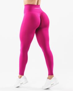 HIGHLIGHTS. High-waisted legging 3-tiered tapered waistband. Seamless, knit fabric. No front seam. Back scrunch seam detail to enhance curves. Leg and glute contouring panels. ForeverKnit core logo on waistband FIT SUGGESTION. This item runs true to Alphalete’s standard seamless fit.. If you are between sizes, we recommend sizing up.. Model is 5’4”/162.5cm, wearing a size XS with a 26”/66cm waist and 39.5”/100.3cm hips. MATERIALS AND WASHING DIRECTIONS. 51% Polyamide, 38% Polyester, 11% Elastane Amplify Leggings, Gym Girlie, Lifting Leggings, Workout Style, Womens Bras, Pink Leggings, Seamless Leggings, Bottom Clothes, High Waisted Leggings