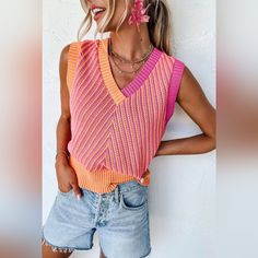 Get Ready For Some Serious Summer Vibes With Our Summer Slush Knit Sleeveless Vest! Made From A Soft Knit Fabric, This Vest Features A Bright And Playful Pink Orange Combo That Will Add A Pop Of Color To Any Outfit. Stay Cool And Stylish All Season Long With This Must-Have Piece. (No Brain Freeze Included!) Runs True With A Straight, Easy Fit Pink Color Block V-neck Top, Trendy Pink Sweater Vest For Winter, Trendy Summer V-neck Sweater Vest, Trendy Pink Sweater Vest For Fall, Pink Knitted Sweater For Layering, Chic Knitted Sweater Vest For Spring, Casual Multicolor V-neck Sweater Vest, Pink V-neck Knit Top, Knitted V-neck Sweater Vest For Spring